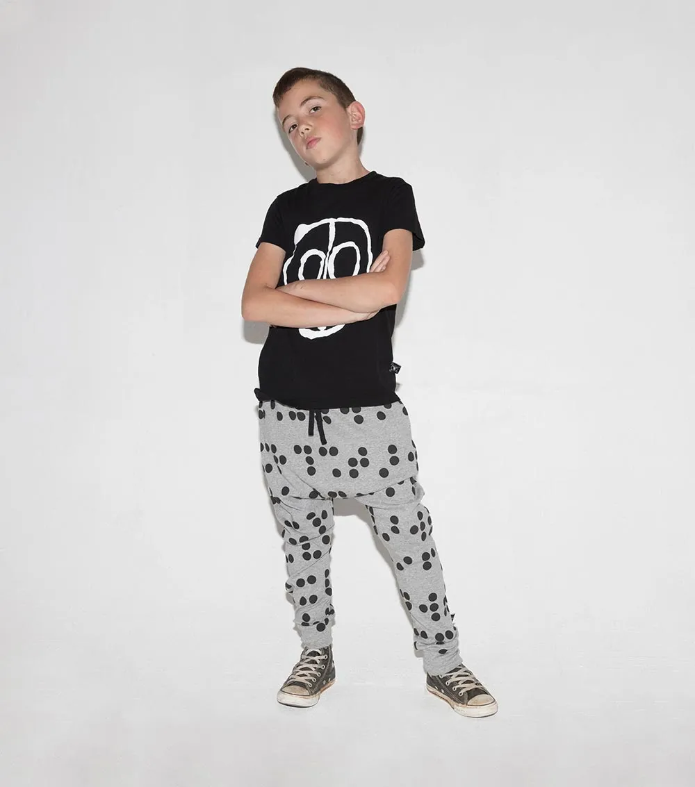 light braille baggy pants