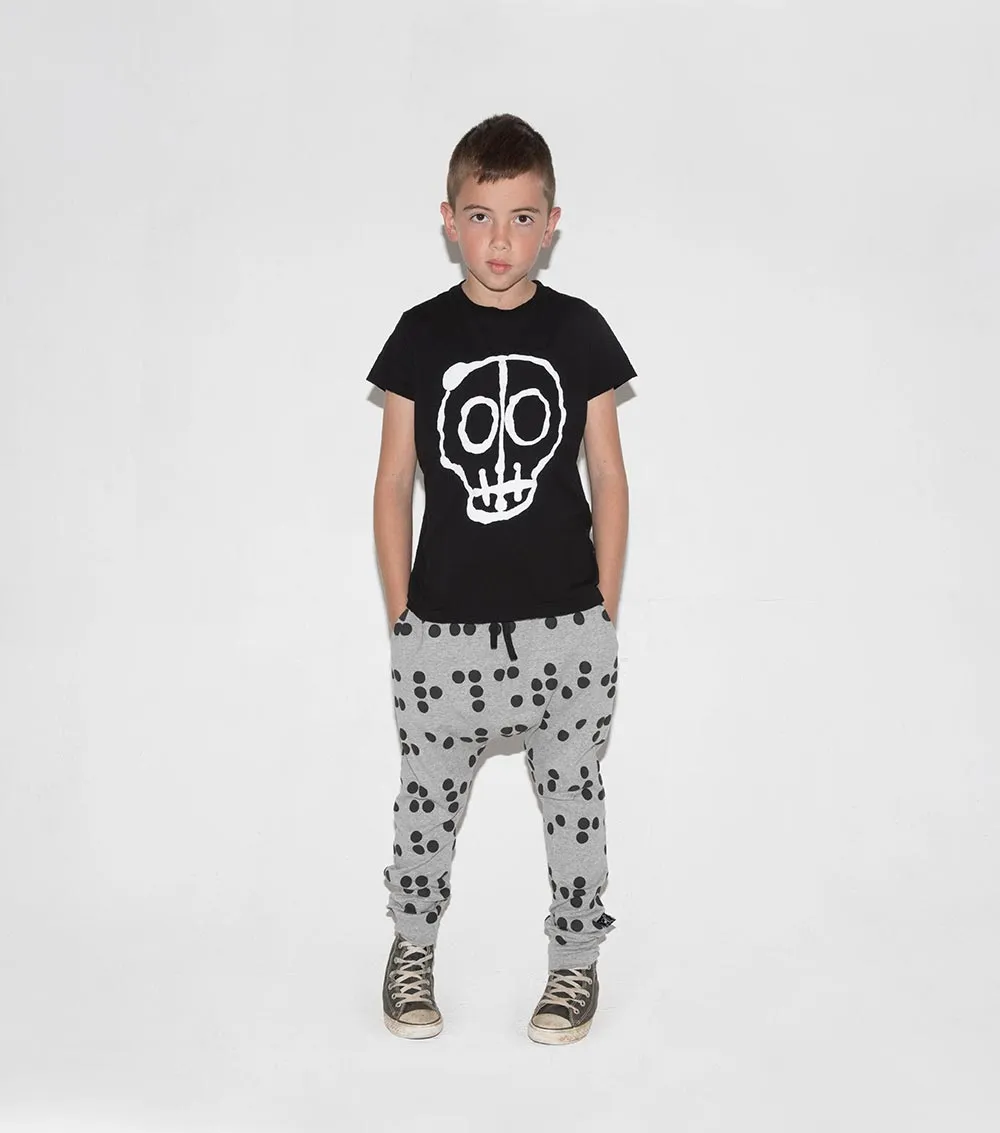 light braille baggy pants
